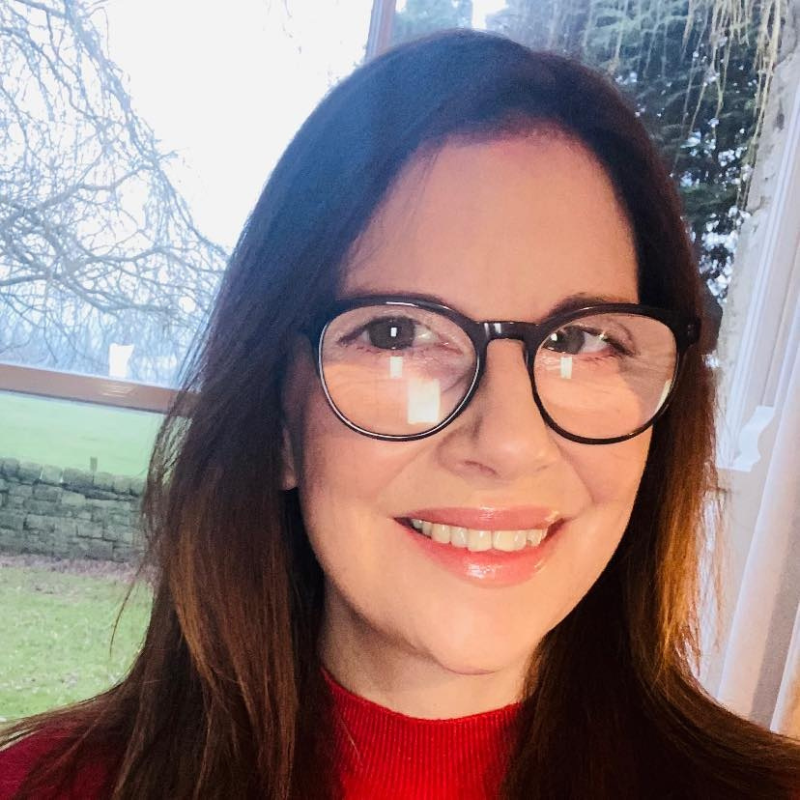 Debbie Miller, Interim Chief Operations Officer at RNIB. Debbie has long brown hair, wears glasses, and is smiling.