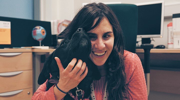 Eye Care Liaison Officer (ECLO) Alba with her guide dog Odette.