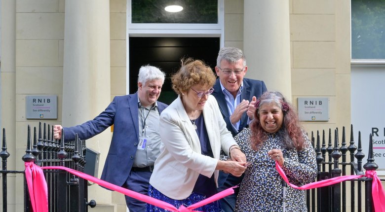 James Adams, Sarah Boyack MSP, Matt Stringer, Kirin Saeed cutting the pink ribbon at Hillside Crescent.