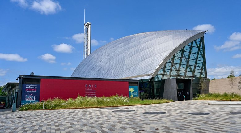 View of the Glasgow Science Centre from the outside, with RNIB signage on the front.